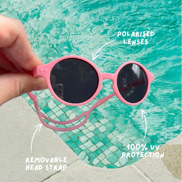 Candy Floss Baby Sunglasses with detachable rubber head strap. Round Frames. For babies 6M-3Y old. Features polaried lenses, removable head strap and 100% UV Protection.