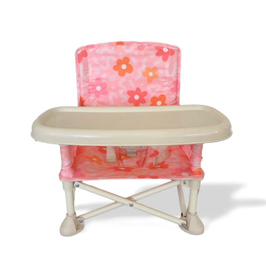 Bloom Portable Baby Highchair with detachable tray. Comes in a carry bag. For kids aged 6M-3Y. Image depicts chair front view
