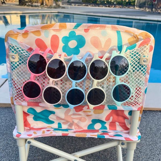 Ziggy Baby Highchair with 5x Sunglasses Colour options hanging on the mesh pocket on the back of the chair. Choose your combination of colours.